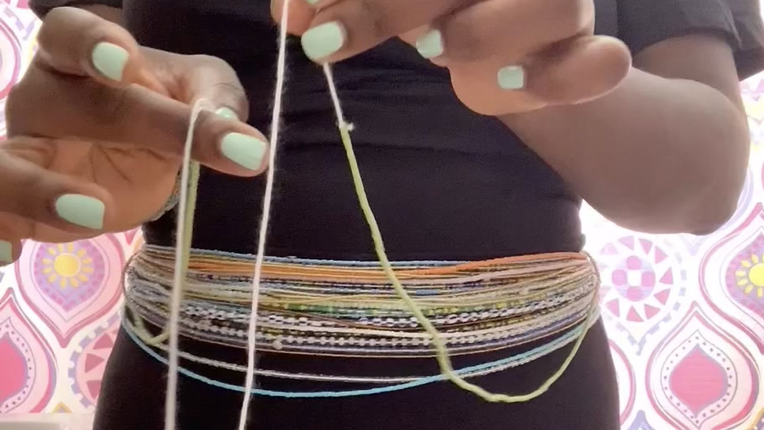 Step by step video on how to tie waist beads